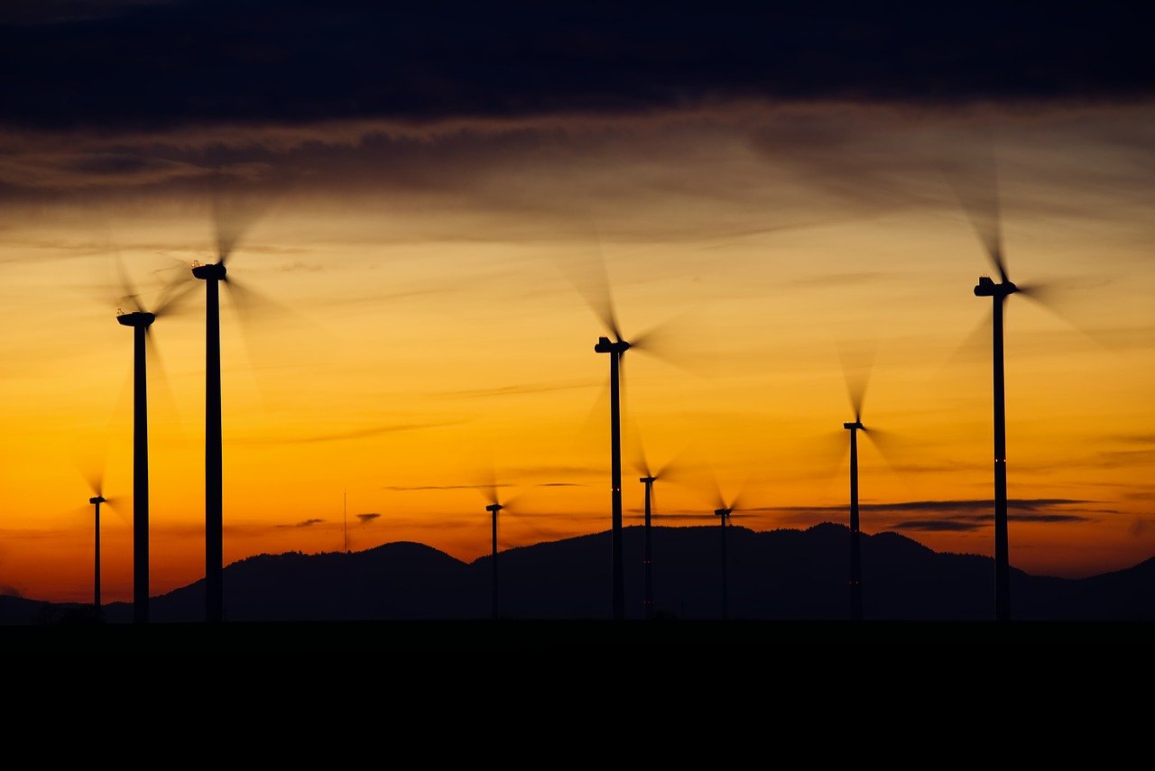 wind turbines, silhouettes, sunset-2991696.jpg